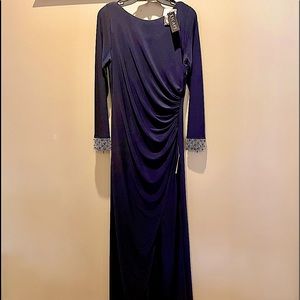 Escape Cowl Back gown with beaded cuffs, a side slit and a draped cowl back.